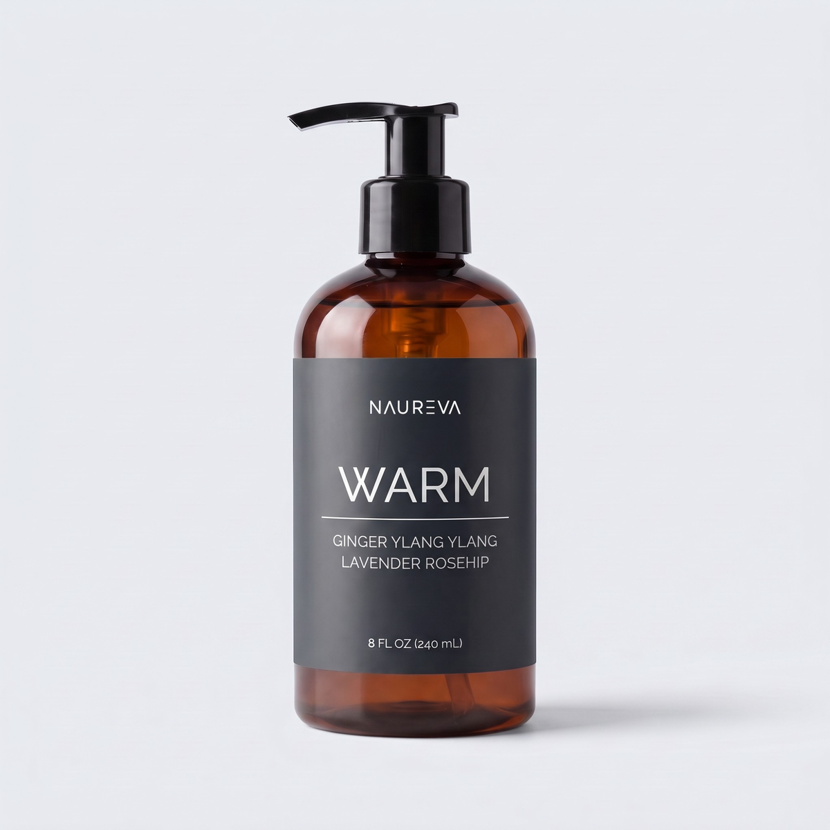 Naureva Warm massage oil with ginger, ylang ylang, lavender and rosehip, 8 fl oz amber pump bottle